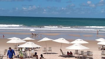 Apartment | Beach | On the beach, white sand, sun-loungers, beach umbrellas