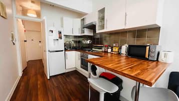 Apartment | Private kitchen | Fridge, microwave, electric kettle