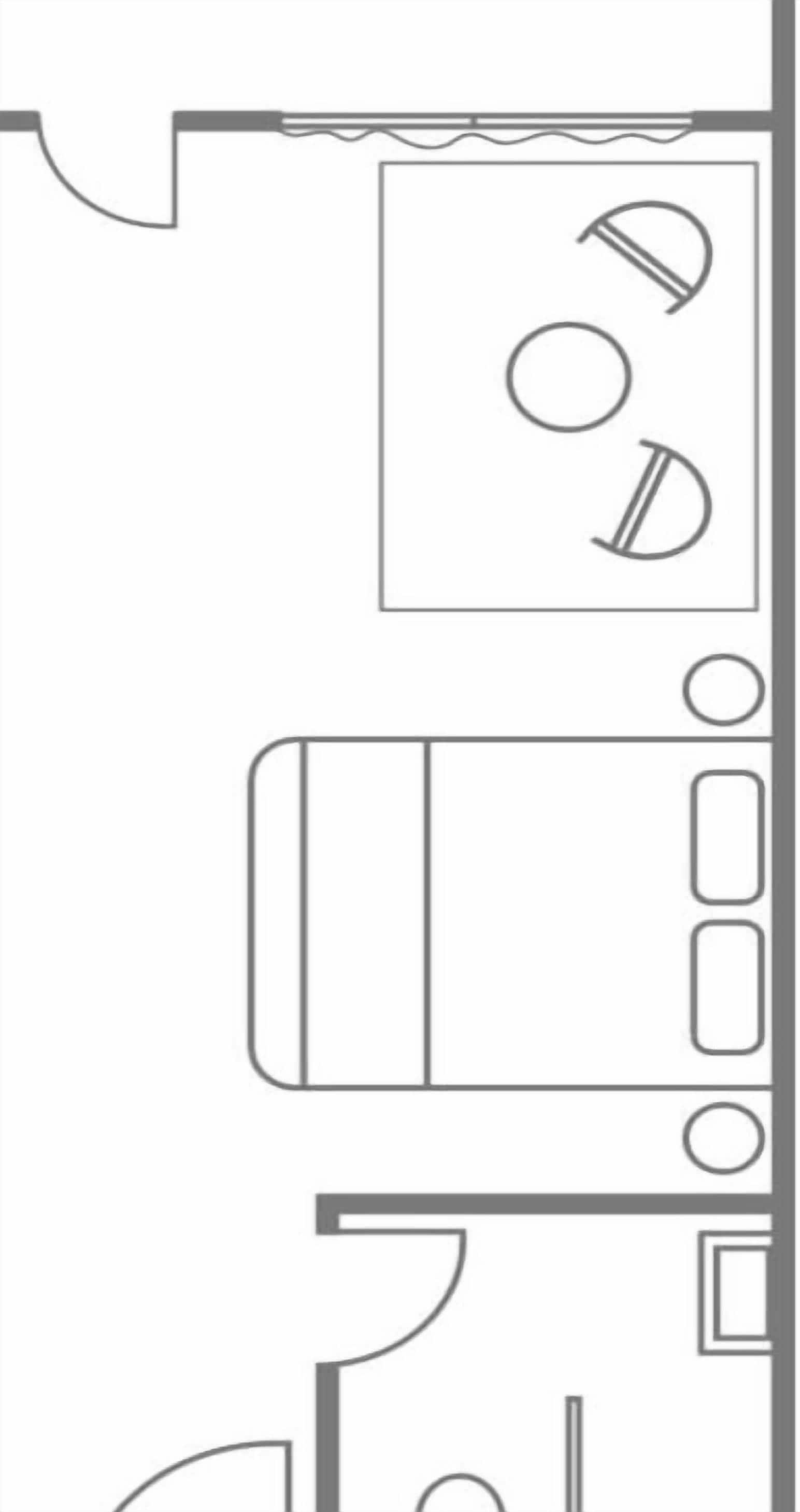 Un plan d’aménagement de chambre d’hôtel comprenant un lit, un bureau et une salle de bain.
