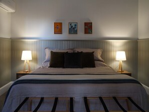 1 bedroom, desk, iron/ironing board, travel cot