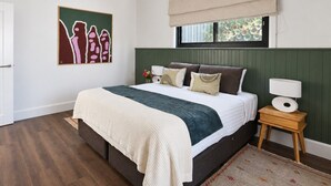 A bedroom with a bed, bedside table, wall art, window with blind, and a ceiling fan. - Shawwood Barrel Room Luxury Mudgee Farm Stay, close to town and wineries (Bombira)