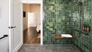 A bathroom with a shower, a towel rack, and a wooden shelf. - Shawwood Barrel Room Luxury Mudgee Farm Stay, close to town and wineries (Bombira)