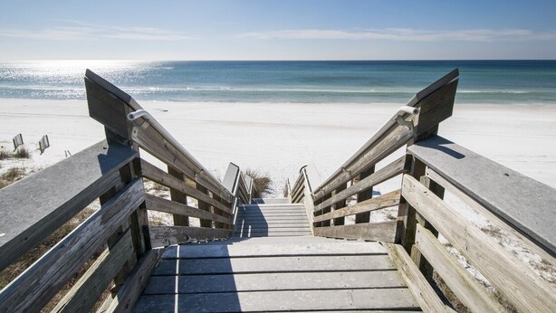 A wooden staircase leading to a beach with a clear view of the ocean. - 30A Private Pool Cottage with Pool and Golf Cart! (Santa Rosa Beach)