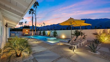 Outdoor pool, free pool cabanas, pool umbrellas