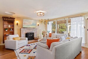 TV, fireplace - Spacious Mesa Home with Great Outdoor Patio and Ocean Views! (Santa Barbara)