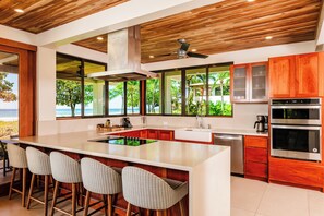Fridge, microwave, oven, stovetop - Rare Find: Beachfront Villa w/ Private Pool & Spacious Backyard, Surf Break Right at Your Doorstep! (Playa Grande)