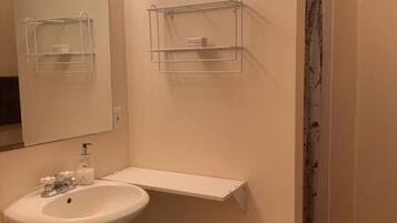Shower, eco-friendly toiletries, hair dryer, towels