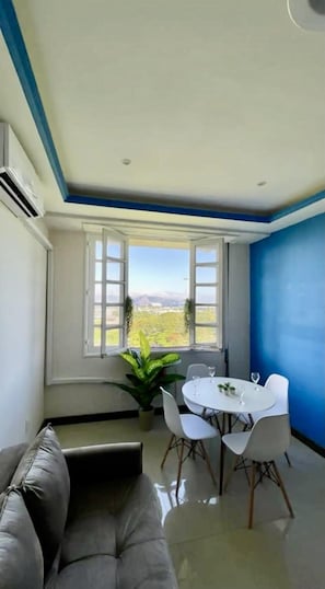 Panoramic Apartment | Living area | Flat-screen TV