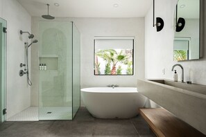 Shower, hair dryer, towels, toilet paper