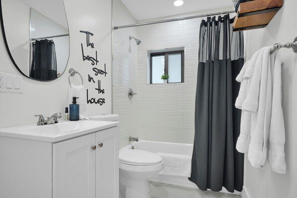 Hair dryer, towels, soap, shampoo