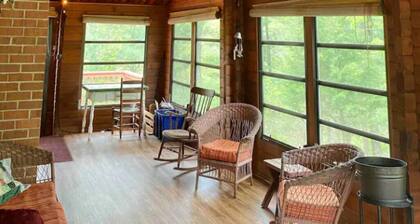 Quiet Log Cabin with private river access and hot tub