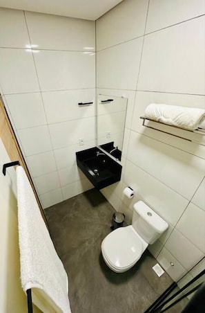 Shower, towels, soap, toilet paper