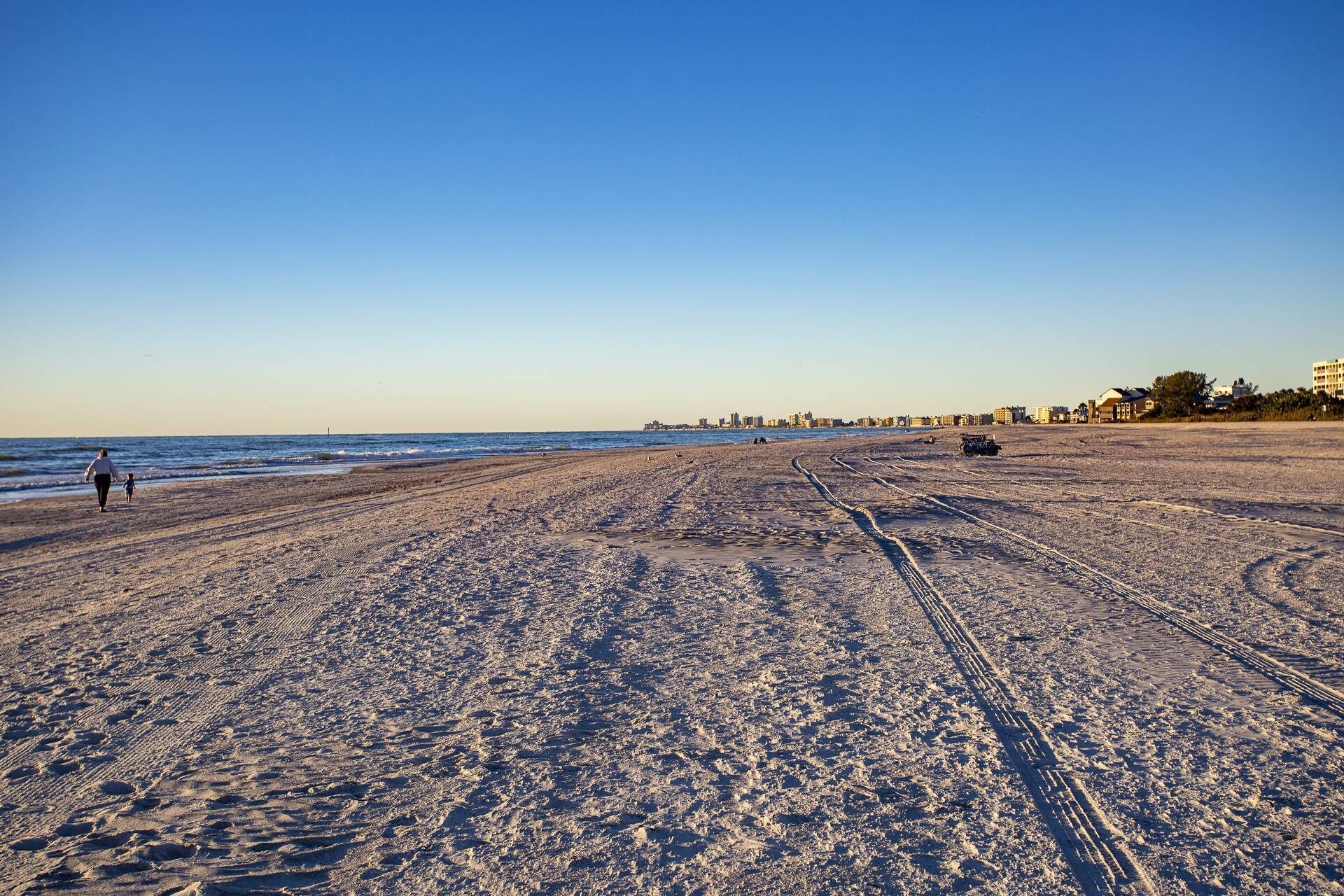 On the beach, beach towels, motor boating, fishing