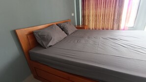 Deluxe Double Room | Bed sheets - OYO 93603 Nurbata Holdings (Mertak)