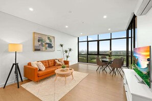 TV, offices - Chic 1-Bed with Pool by River, Ferry & Amenities (Wentworth Point)