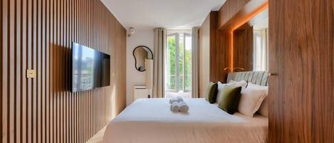 1 slaapkamer, een strijkplank/strijkijzer, wifi, beddengoed