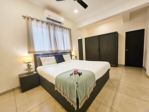 4 chambres, coffres-forts dans les chambres, fer et planche à repasser