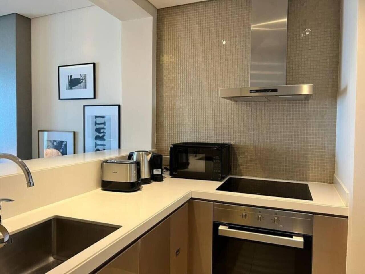 Fridge, coffee/tea maker, cookware/dishes/utensils