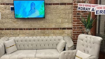 Chambre Standard | Coin séjour | Télévision à écran plat