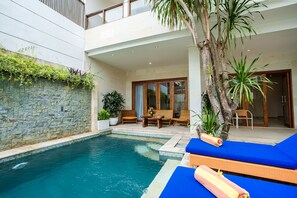 Outdoor pool, pool umbrellas, pool loungers
