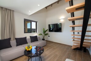 Villa | Living area | 65-inch Smart TV with cable channels - Armour Eclectic Villa (Platanias)