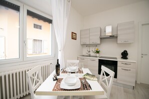 Design Apartment | Living area | 30-inch TV with digital channels - La Torretta (Moniga del Garda)