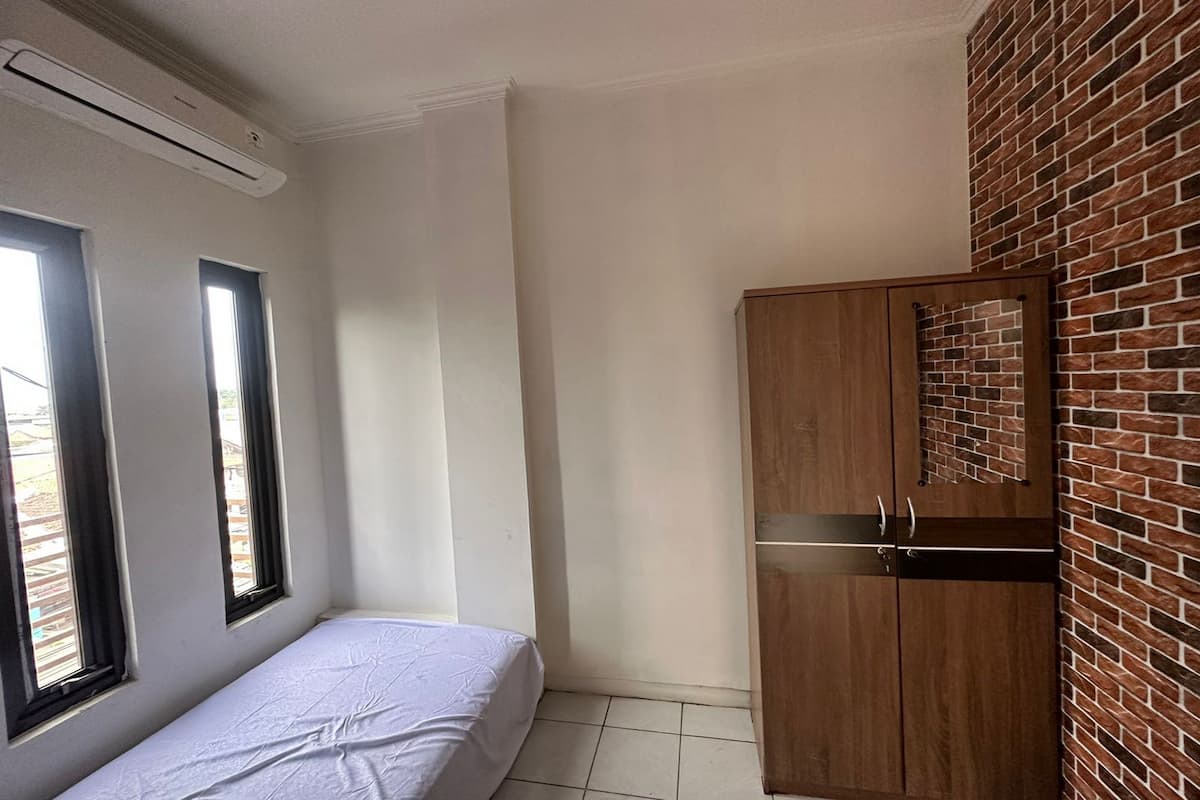 Habitación individual económica | Ropa de cama