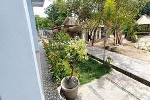 Free WiFi, bed sheets - Hotel O Lotus Guest House (Tetebatu)