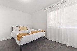 2 dormitorios, tabla de planchar con plancha, wifi gratis y ropa de cama
