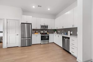 Fridge, microwave, oven, stovetop - Modern Nulu 2BR CozySuites 02 (Louisville)