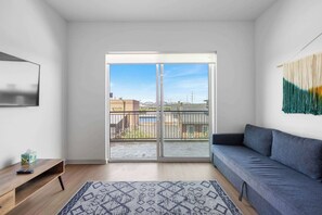 TV, offices - Modern Nulu 2BR CozySuites 02 (Louisville)