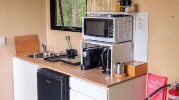 Fridge, microwave, stovetop, coffee/tea maker