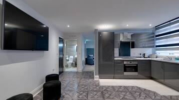 Grand Apartment | Private kitchen | Full-sized fridge, oven, electric kettle, toaster