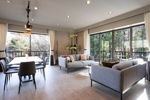 Design House | Living area | 48-inch LCD TV with cable channels, heated floors - Forest Suite Hakone Sengokuhara (Hakone)