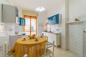 Standard Apartment, Multiple Bedrooms, 2 Bathrooms (Casa Gallipolina with sea view) | Private kitchen | Fridge, oven, stovetop, coffee/tea maker