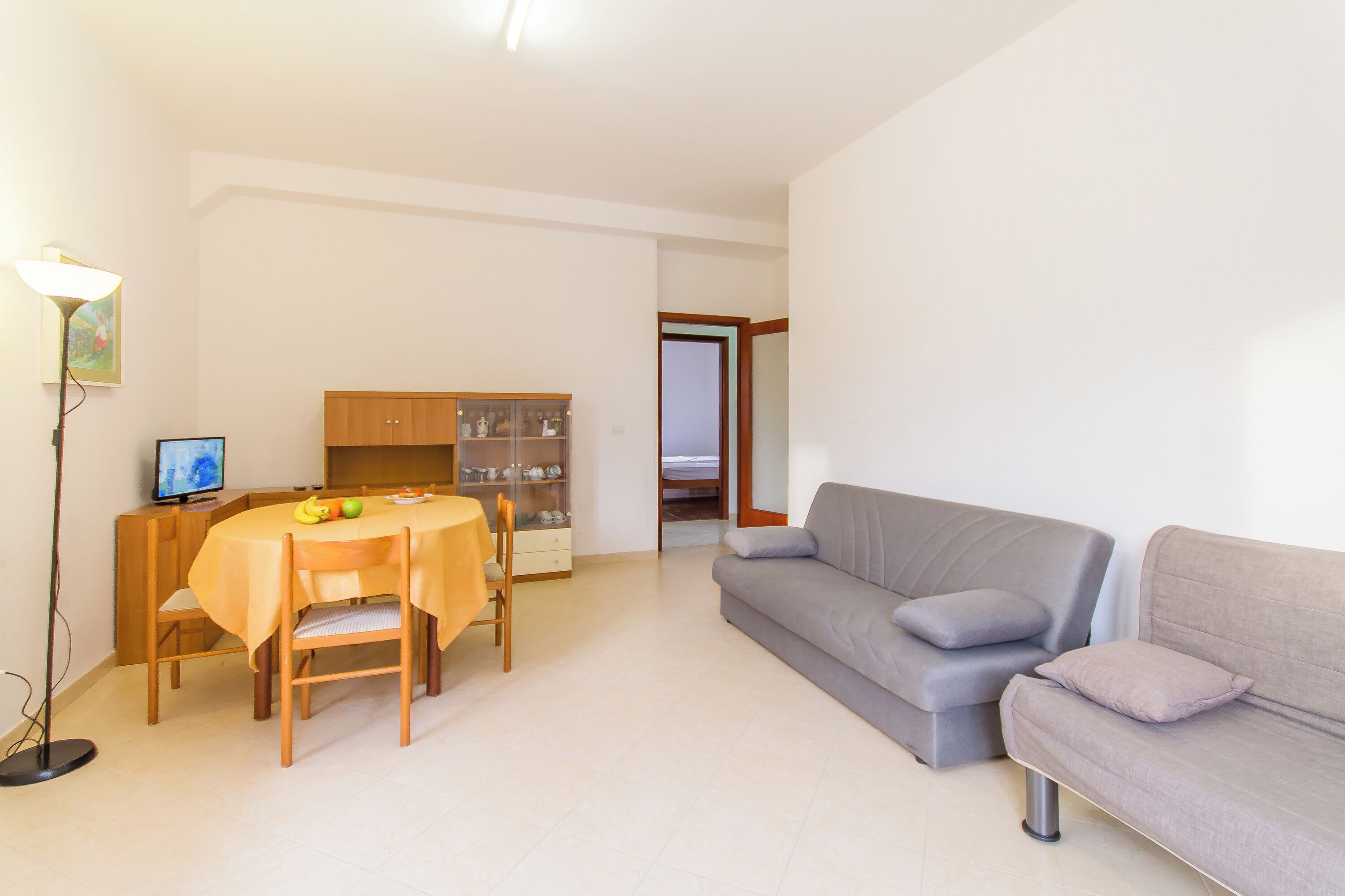 21-inch flat-screen TV with cable channels, TV