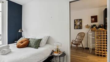 1 bedroom, desk, iron/ironing board, travel crib