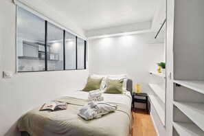 1 bedroom, desk, iron/ironing board, travel cot