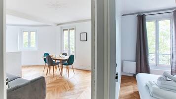 1 bedroom, desk, iron/ironing board, travel crib