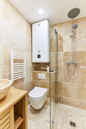 Shower, hair dryer, towels, soap