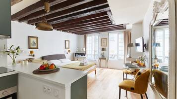 1 bedroom, desk, iron/ironing board, travel crib