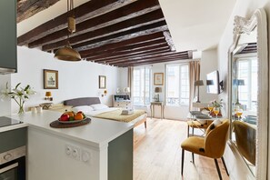 1 bedroom, desk, iron/ironing board, travel crib