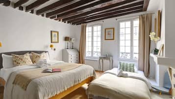 1 bedroom, desk, iron/ironing board, travel crib