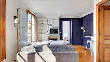 1 bedroom, desk, iron/ironing board, travel crib