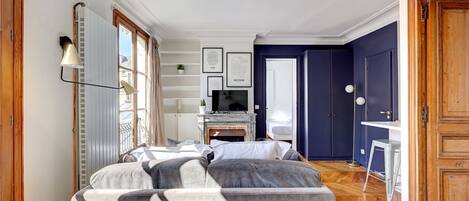 1 bedroom, desk, iron/ironing board, travel crib