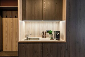 Fridge, microwave, stovetop, coffee/tea maker