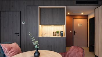 Fridge, microwave, coffee/tea maker, dining tables