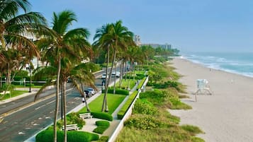 On the beach, sun loungers, beach towels