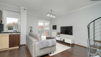 Apartemen, 1 kamar tidur, teras | Area keluarga
