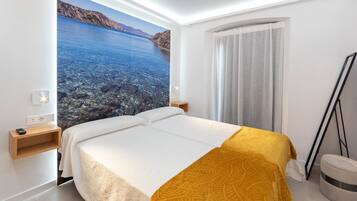 1 slaapkamer, een strijkplank/strijkijzer